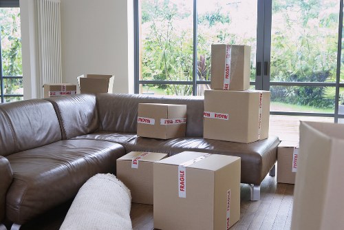 Packed boxes and furniture ready for a house move in Anerley