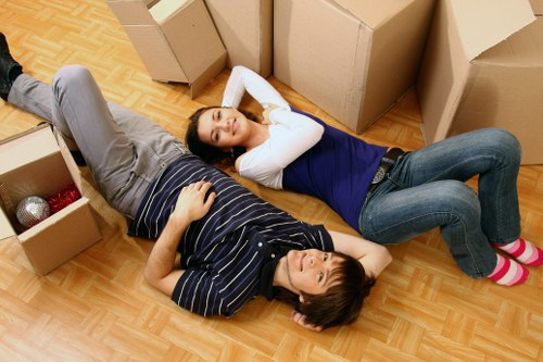 Professional removals team loading items for a local relocation