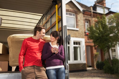 Mover checking a loaded vehicle for safe item positioning