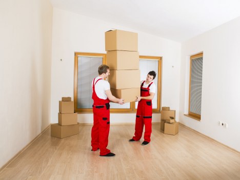 Furniture and boxes being loaded for a house move in Anerley