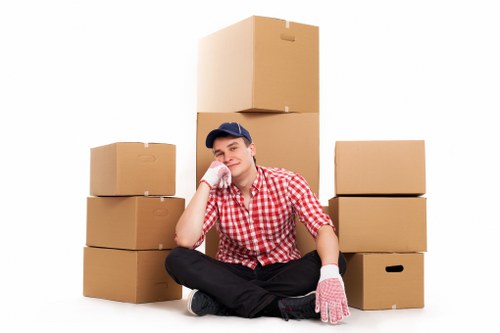 Packed boxes and furniture ready for a local removal service